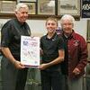 Luke Ensor with Governor Parson and President of the Shelby County Historical Society Kathleen Wilham. Luke showed the Governor his poster when at the Shelby County Historical Society Museum in Shelbina on Monday. Luke’s poster will be on display at the museum. Photograph by Marlana Smith