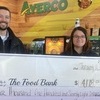 Pictured presenting the check are Brad Ayers, Operations Director, and Desiree Chatfield Assistant Manager  -  Ayerco Store #32 in Canton Mo.